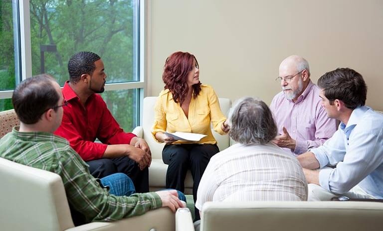 Individuals Talking in Circle